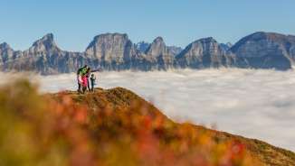 Famiglia sul Flumserberg sopra il mare di nebbia