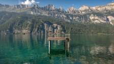 Pontile nel lago di Walen con Churfirsten sullo sfondo